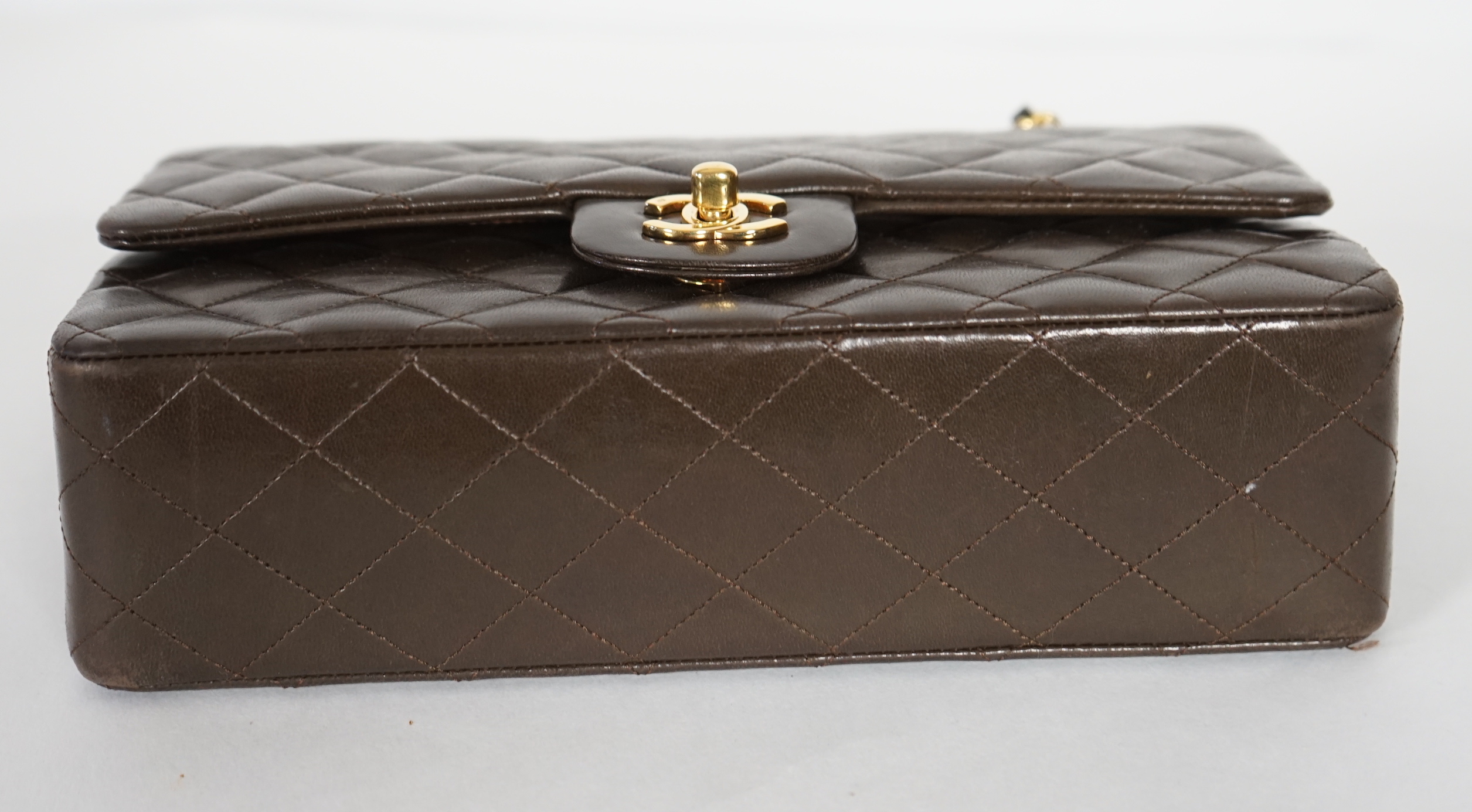 A Chanel brown quilted lambskin medium Classic Double Flap bag, width 25.5cm, height 15.5cm, depth 7cm